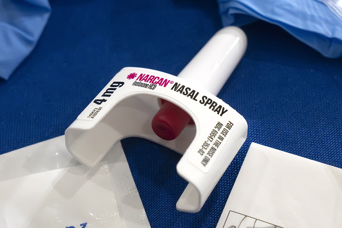 A container of Narcan, a brand name version of the opioid overdose-reversal drug naloxone, sits on a table following a demonstration at the Health and Human Services Humphrey Building on Friday, Sept. 8, 2023, in Washington. The number of U.S. fatal overdoses fell in 2023 — for only the second time since the current national epidemic of drug deaths began more than three decades ago. The Centers for Disease Control and Prevention posted the numbers on Wednesday, May 15, 2024. (AP Photo/Mark Schiefelbein, File)