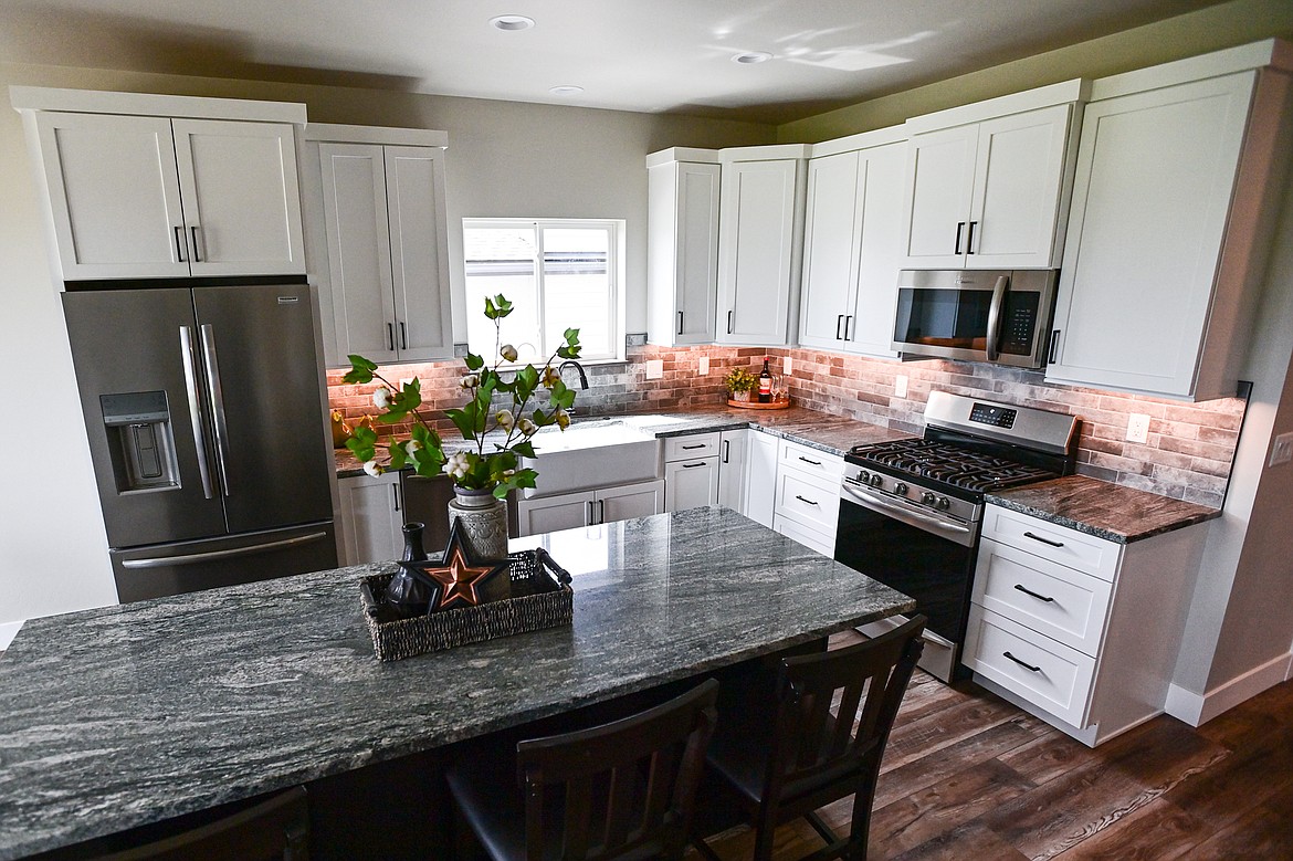 The kitchen is shown during an open house for the latest finished home in the Kalispell Student Built Homes program at 225 Northridge Way on Wednesday, May 15. (Casey Kreider/Daily Inter Lake)