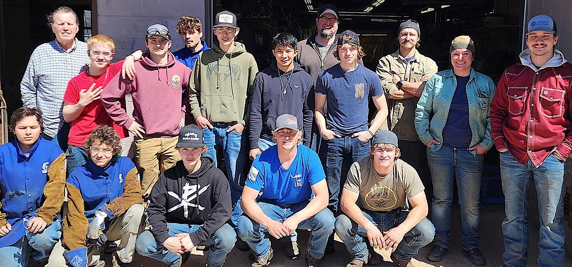 Here are the members of the Libby High School welding group and their educators, Jason Quintanilla, Mort Curtiss, Kethan Farnsworth, Adam Stufflebeam, Vincent Moore, Jaylor Weilacher, Riley Orsborn, Khonnor Peterson, Gabriel Gier, Joel Goodman, Certified Welding Inspector Blake Thompson, Garrett Place, Connor Benson and Flathead Valley Community College Welding Instructors Chris Sherman, Julie Arnold and Bruce Higbee. (Photo courtesy John Love)