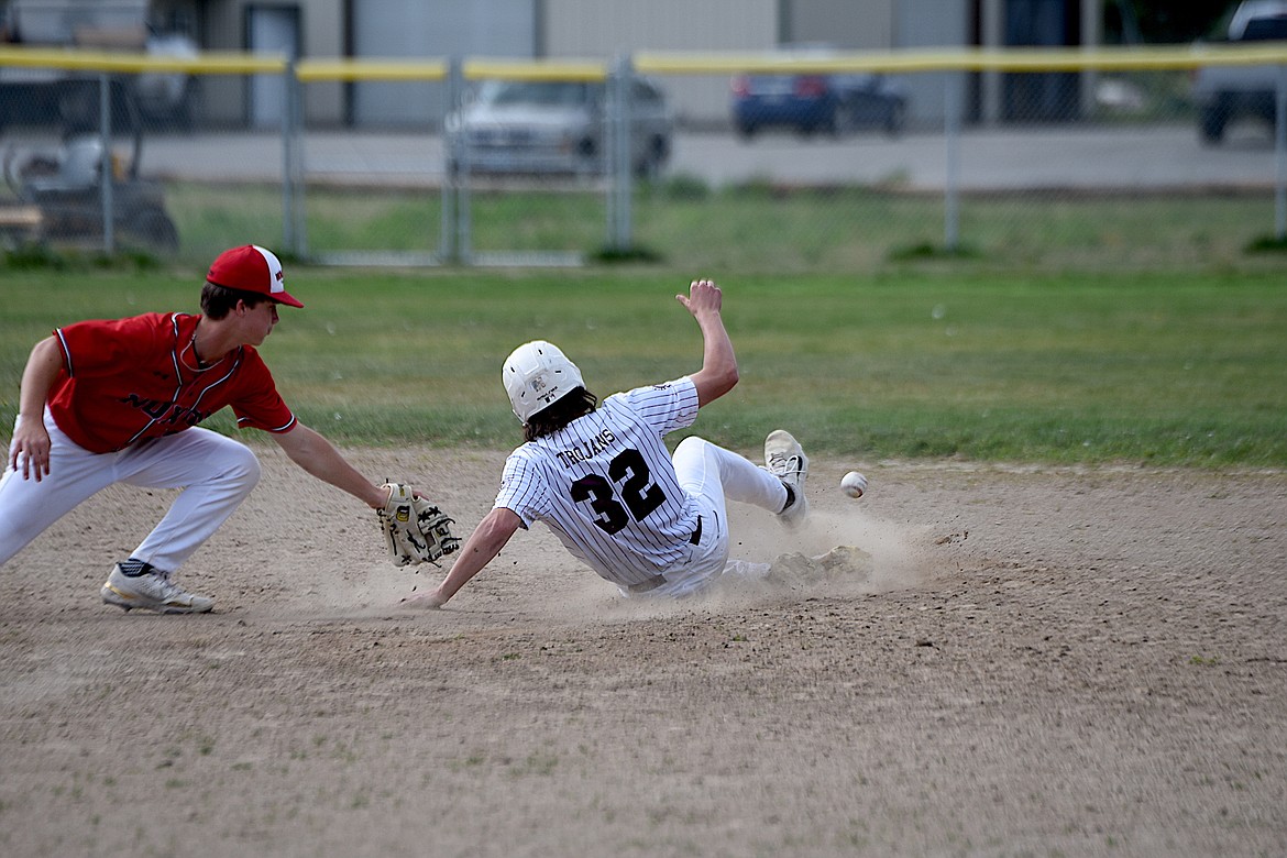 Troy's Braxton Pinyard steals second base against Noxon on Tuesday, May 14, 2024. (Scott Shindledecker/The Western News)