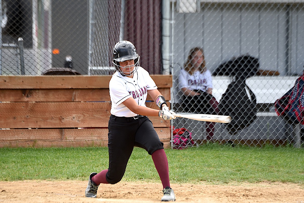 Troy third baseman Ainsley Huitron connects for a hit against Plains on Tuesday, May 14, 2024. (Scott Shindledecker/The Western News)