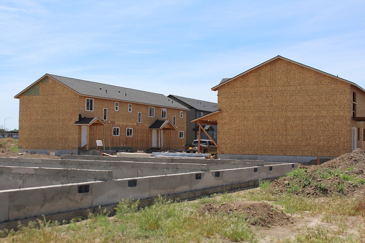 New townhouses under construction in Moses Lake, with the foundation for another unit in the foreground. Housing is in short supply statewide including Grant and Adams countries, according to a report from the Washington Department of Commerce.