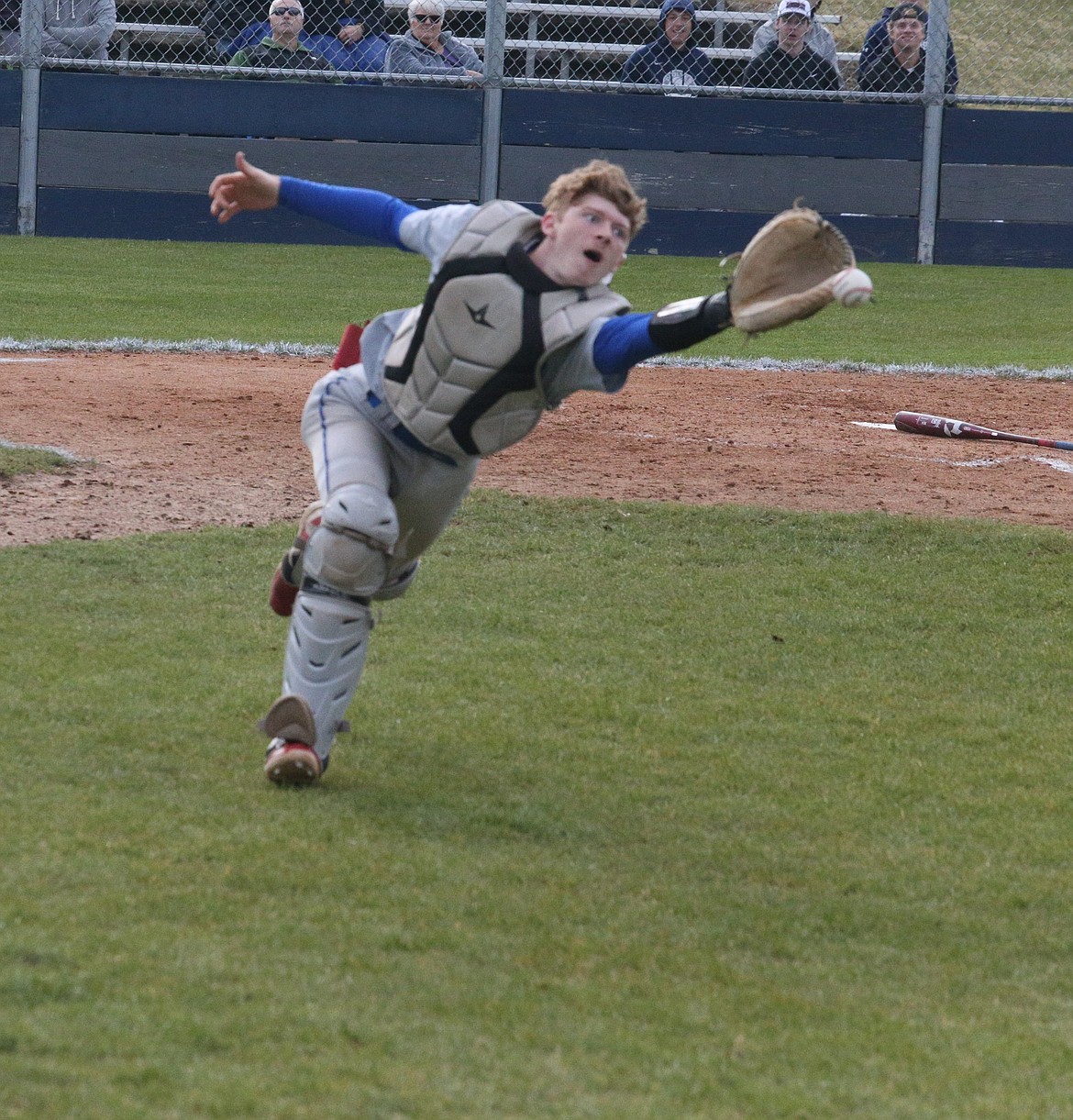 JASON ELLIOTT/Press
Coeur d'Alene senior catcher Chase Saunders attempts to bring in a foul ball during the 5A Region 1 baseball championship game at Lake City High. Coeur d'Alene will face Lake City in the opening round of the 5A tournament tonight at Wolfe Field in Caldwell.