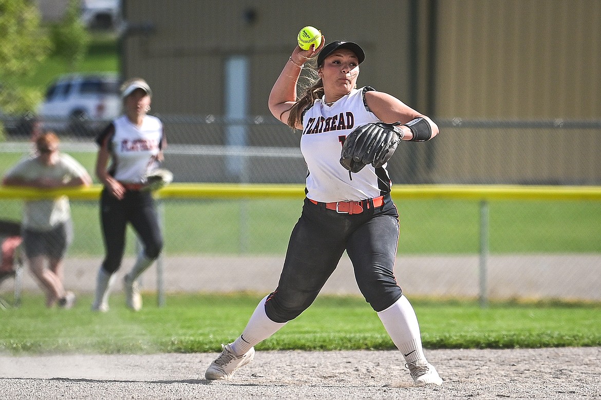 Flathead shortstop Reese Conley (17) throws to first for an out against Glacier at Kidsports Complex on Thursday, May 16. (Casey Kreider/Daily Inter Lake)