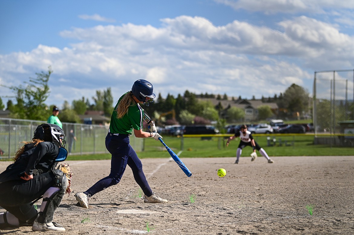 Glacier's Nakiah Persinger (8) connects on a single in the first inning against Flathead at Kidsports Complex on Thursday, May 16. (Casey Kreider/Daily Inter Lake)