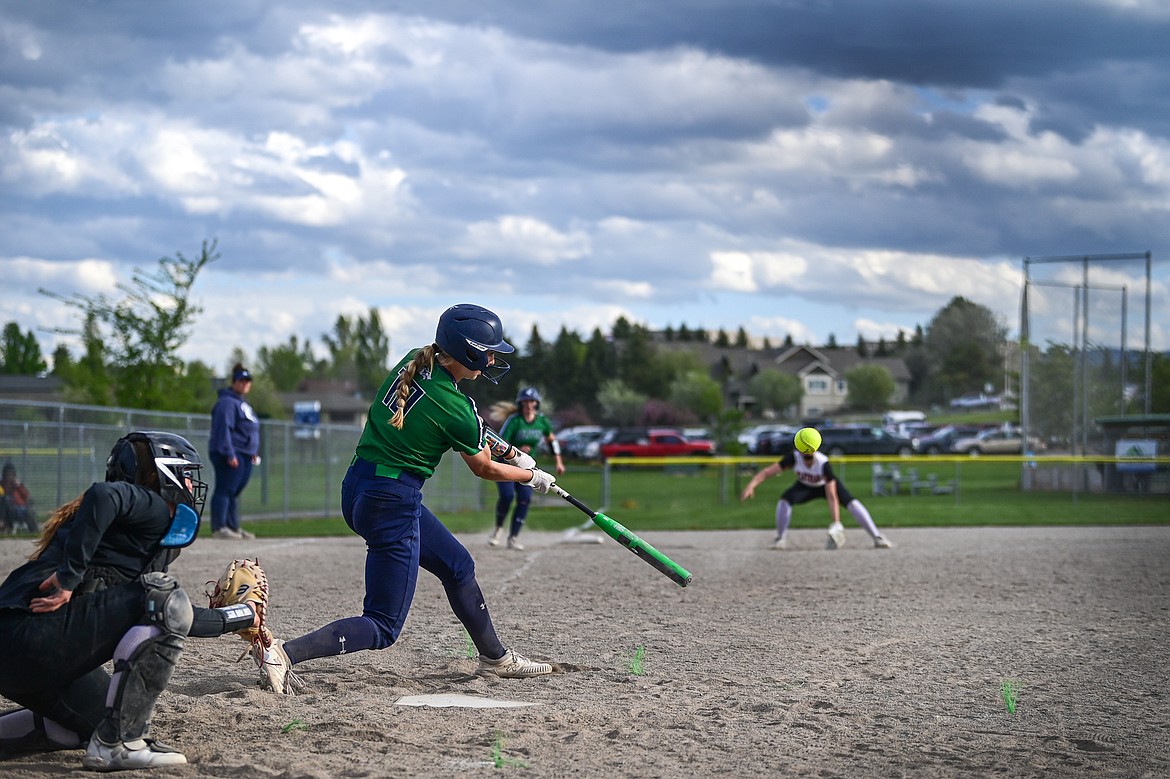 Glacier's Olivia Warriner (10) drives in three runs with a double in the seventh inning against Flathead at Kidsports Complex on Thursday, May 16. (Casey Kreider/Daily Inter Lake)