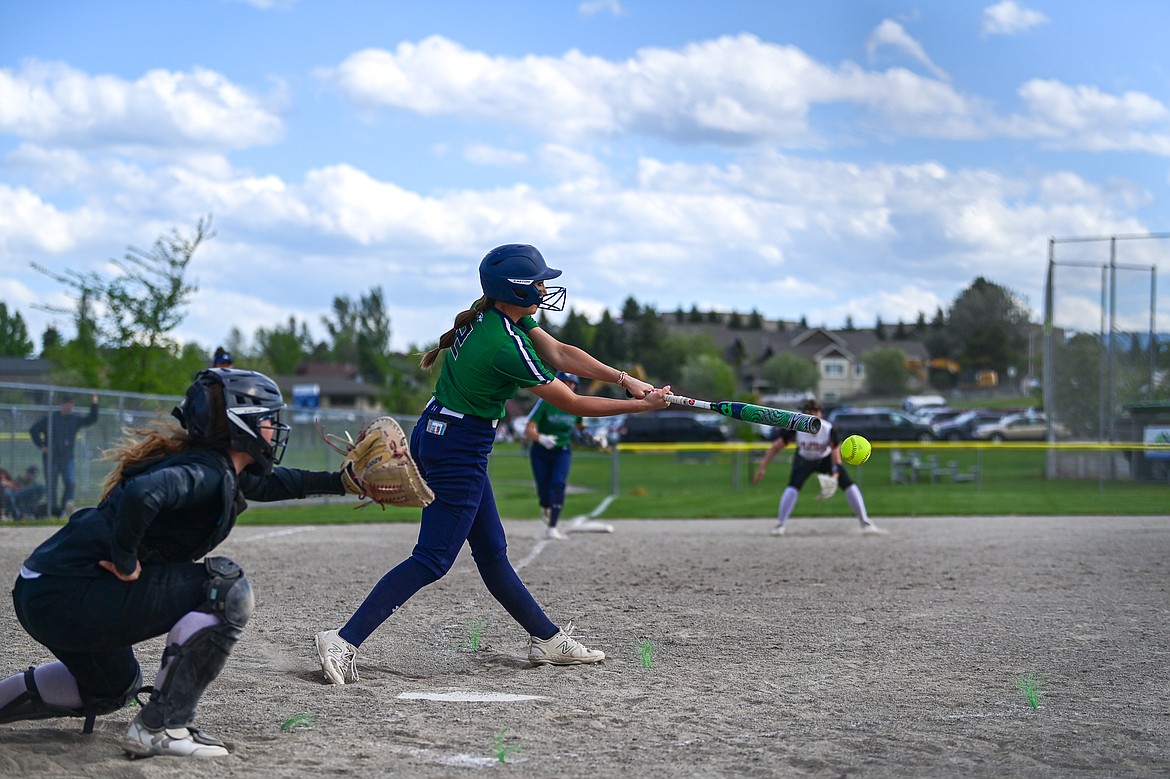 Glacier's Kenadie Goudette (2) drives in a run with a single in the second inning against Flathead at Kidsports Complex on Thursday, May 16. (Casey Kreider/Daily Inter Lake)