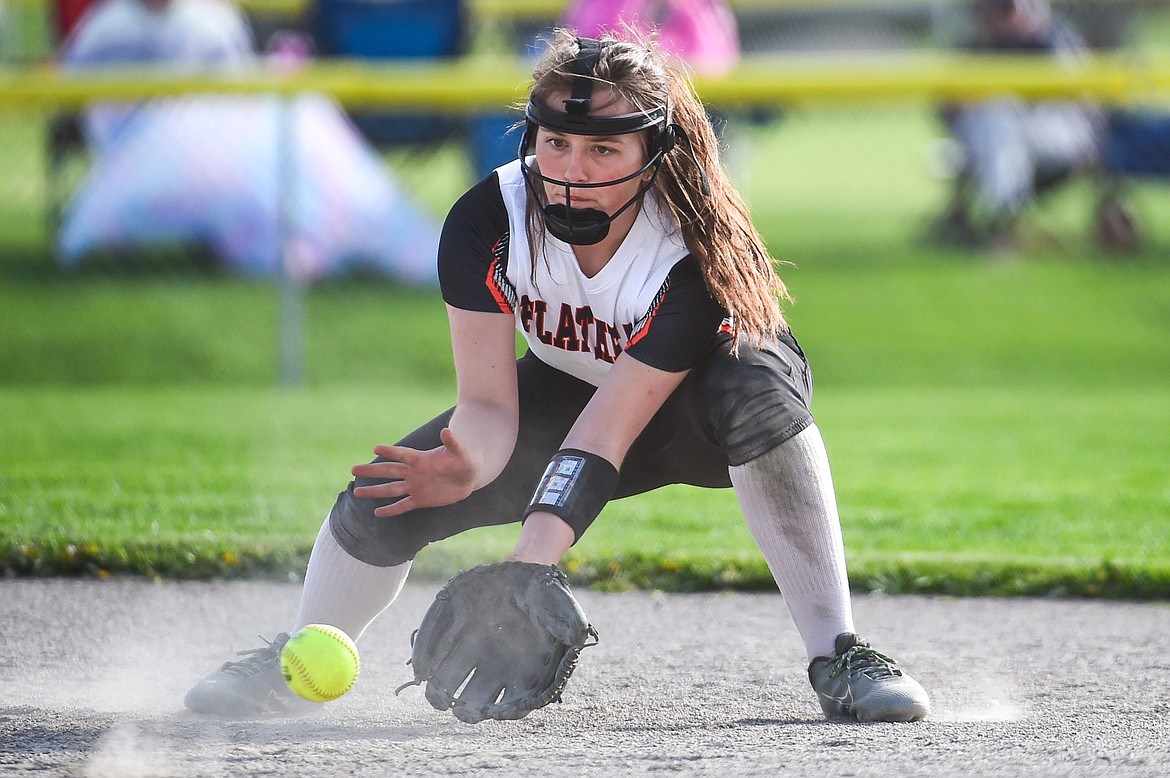 Flathead second baseman Ava Bessen (4) watches a grounder into her glove against Glacier at Kidsports Complex on Thursday, May 16. (Casey Kreider/Daily Inter Lake)