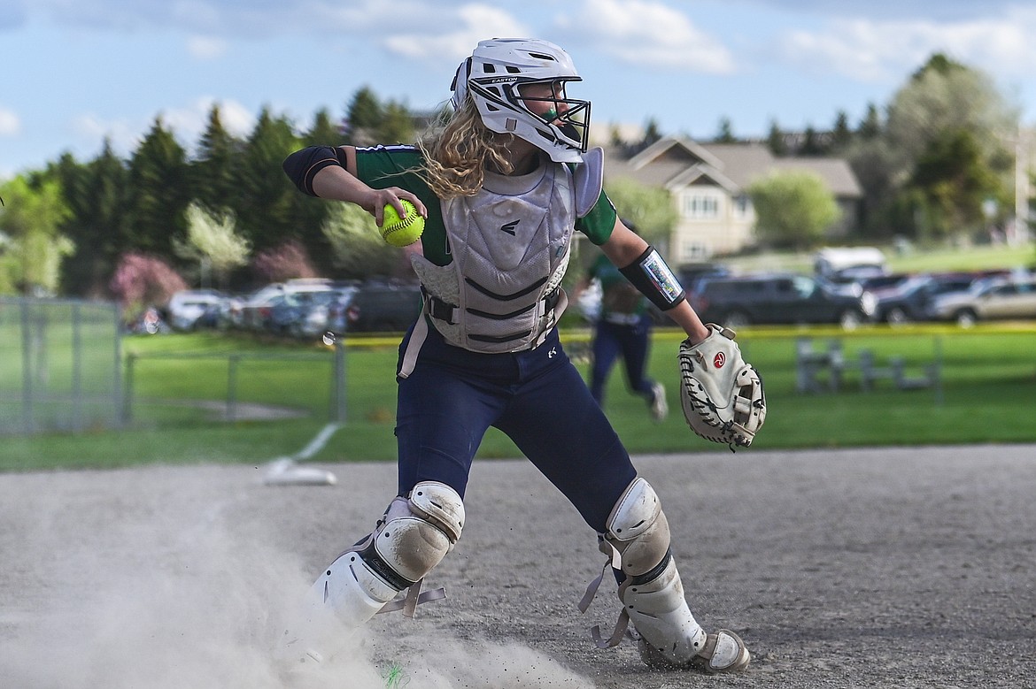 Glacier catcher Cazz Rankosky (7) fires to first for an out after fielding a bunt against Flathead at Kidsports Complex on Thursday, May 16. (Casey Kreider/Daily Inter Lake)