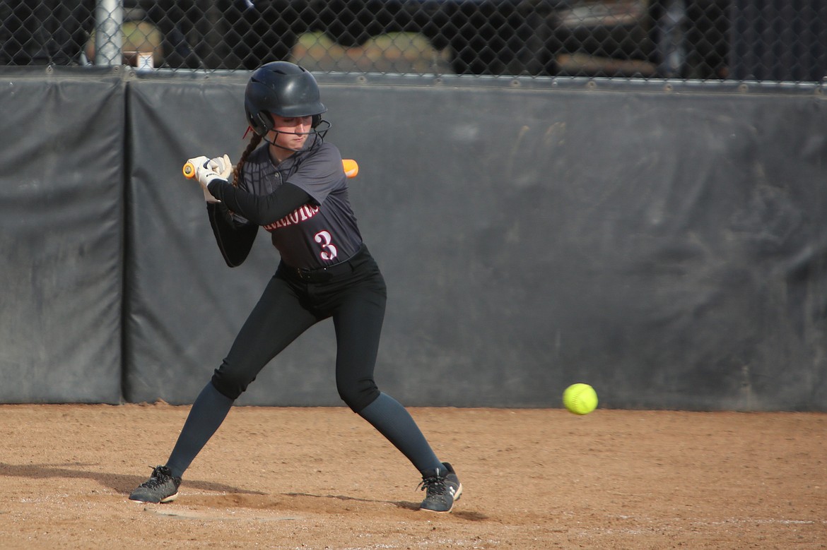 Almira/Coulee-Hartline junior Emma Whitaker keeps her eye on the ball while standing in the batter’s box during an April 27 game against Republic. The Warriors won an academic state championship this season, posting the highest team GPA average in 1B fastpitch softball.