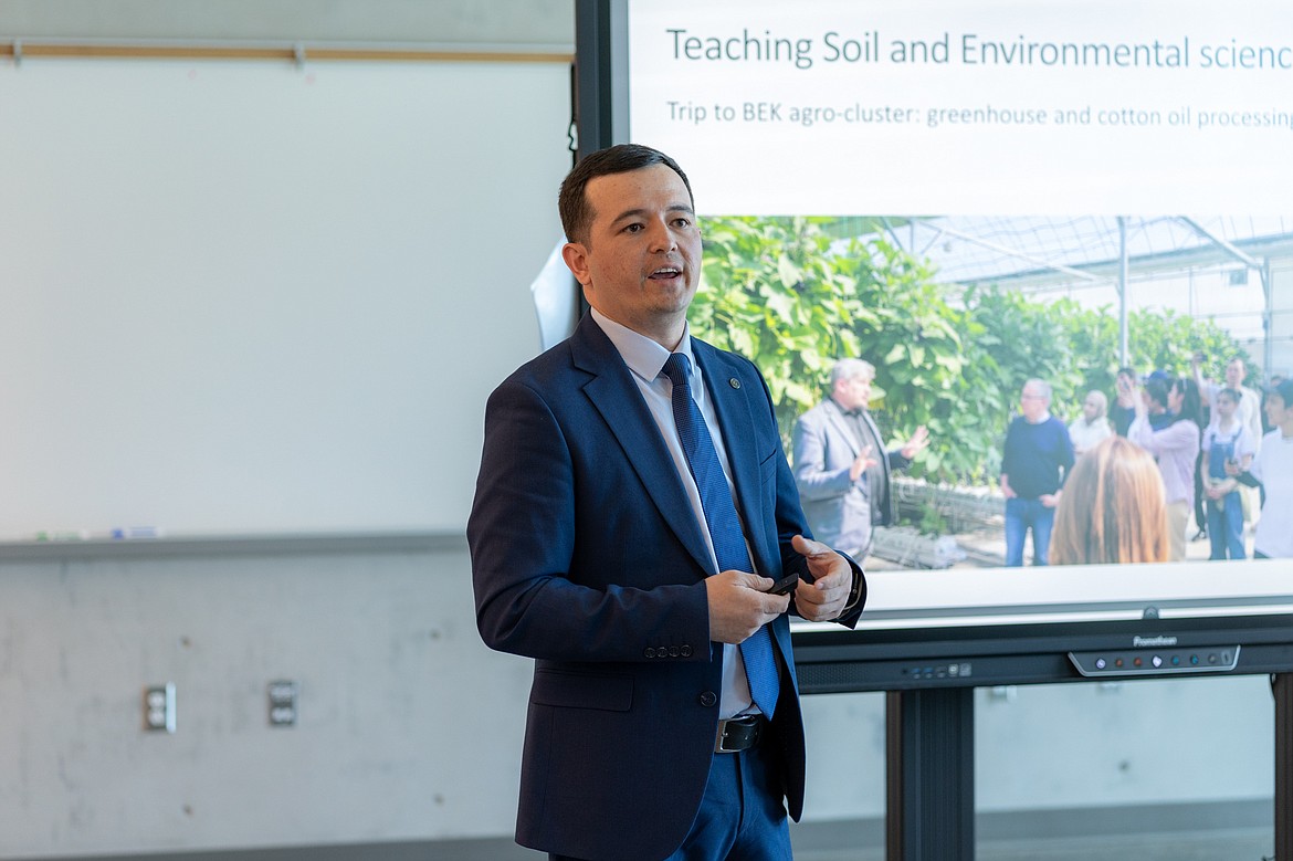 A delegation of Uzbek business owners and college professors visited Big Bend Community College Tuesday. Bahtiyorjon Abdusattarov, program director at the International Agricultural University in Tashkent, pictured, gave a presentation on Uzbekistan’s challenges and opportunities.