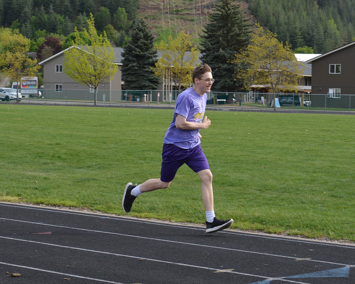 Devin Webber sprints along the track at Kellogg Middle School.