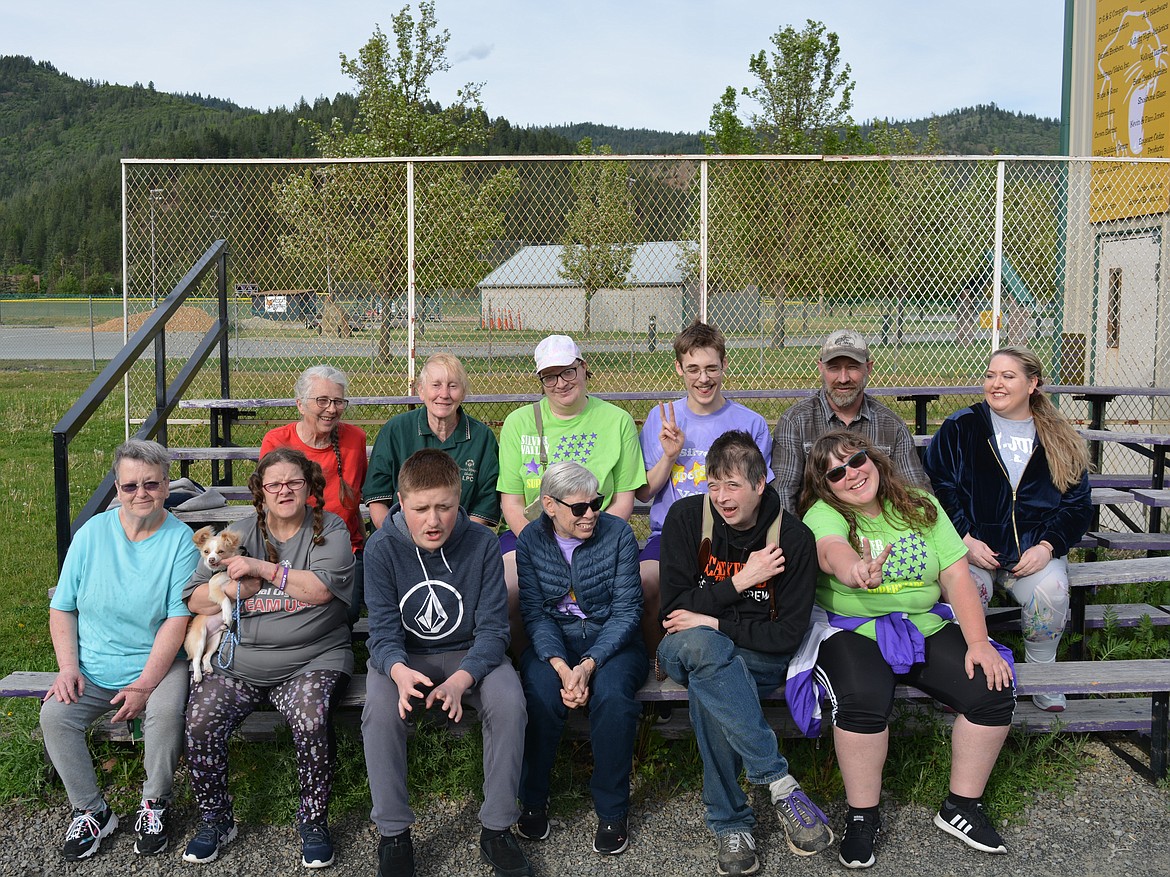 The Silver Valley Olympics team is competing Saturday in Moscow. The group is looking for more athletes and volunteers to join the program. 
Front row: Joanne Coast, Luke the dog, April Cason, Connor North, Landa Lacey, Justin Argiro and Kristin Payne. 
Back row: Donna Davis, Dianna  Macklin, Wanda Stout, Devin Webber, Corey North and Mandi Webber.
Not pictured: Andrea Mousseau, Coach Sue Hanson-Barber, Coach Brooke Bening and  Matthew Bottman.