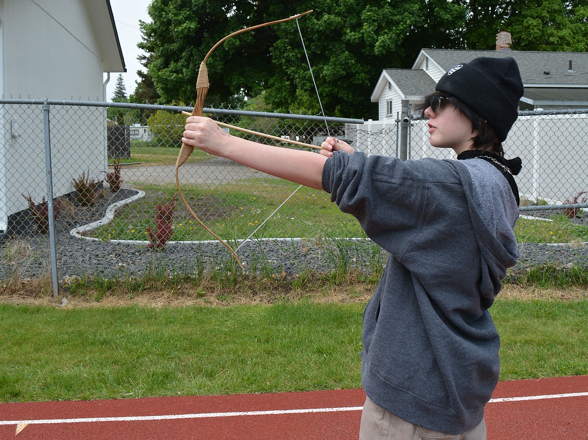 Lakes Middle School student Francis Daniels used to do archery in the woods while living in Montana and was excited to try it again when Civil War reenactors came to the school to teach about life in the 1800s.