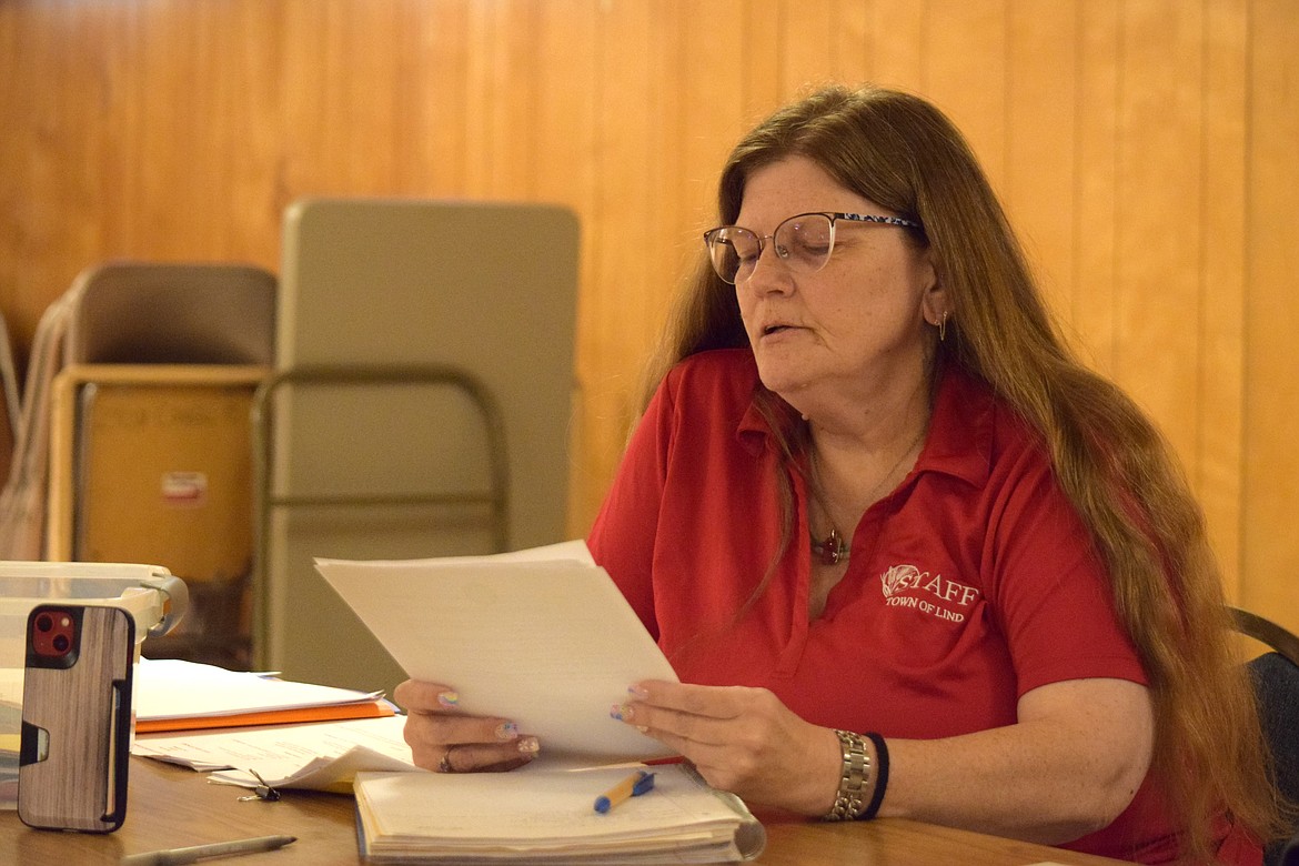 Lind Town Clerk and Treasurer Barbara Pence addresses the council during Tuesday’s regular Lind Town Council meeting regarding the State Auditor’s Office’s finding that she overpaid herself by $1,600 since she was hired by the town in 2021. Pence said some of that has already been rectified and the remainder will be repaid.