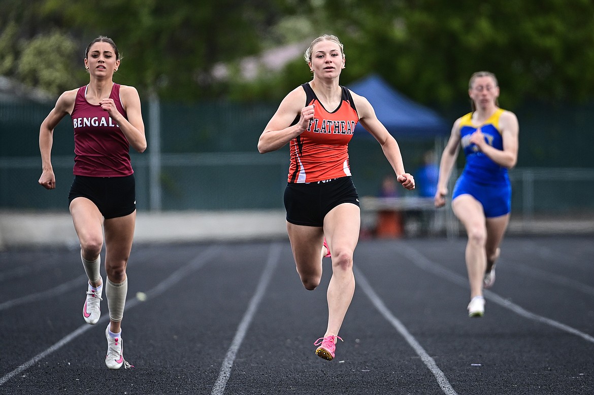Flathead's Alivia Rinehart took first place in the girls 200 meter run with a time of 25.35 at the Western AA Divisionals at Legends Stadium on Saturday, May 18. (Casey Kreider/Daily Inter Lake)