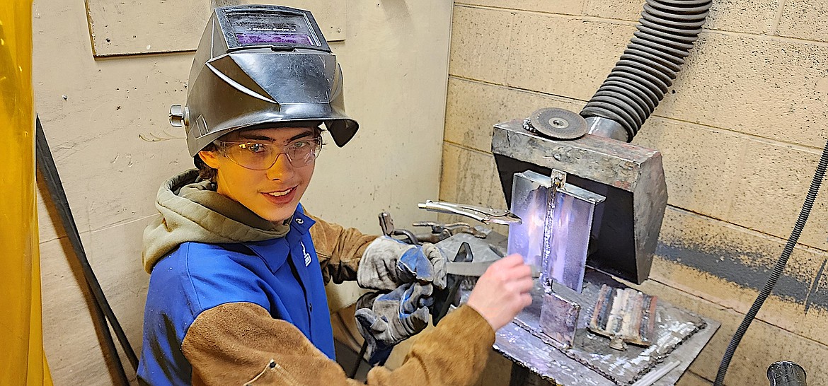 Libby welding student Khonnor Peterson shows off his work. (Photo courtesy John Love)