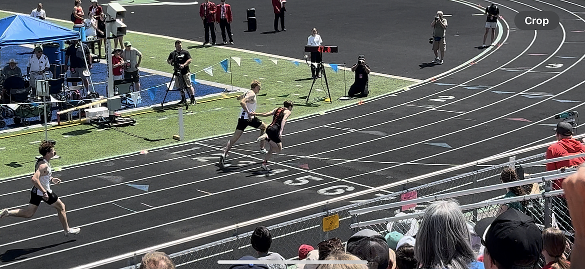 Courtesy photo
In this image captured by a video, Post Falls junior Cobe Cameron edges Rocky Mountain senior Braden Ankeny at the finish line to win the state 5A boys 400-meter dash on Saturday at Mountain View High in Meridian. Cameron won in 47.79 seconds, a new school record and was .29 seconds from a meet record set by Liam Murray of Boise in 2022.