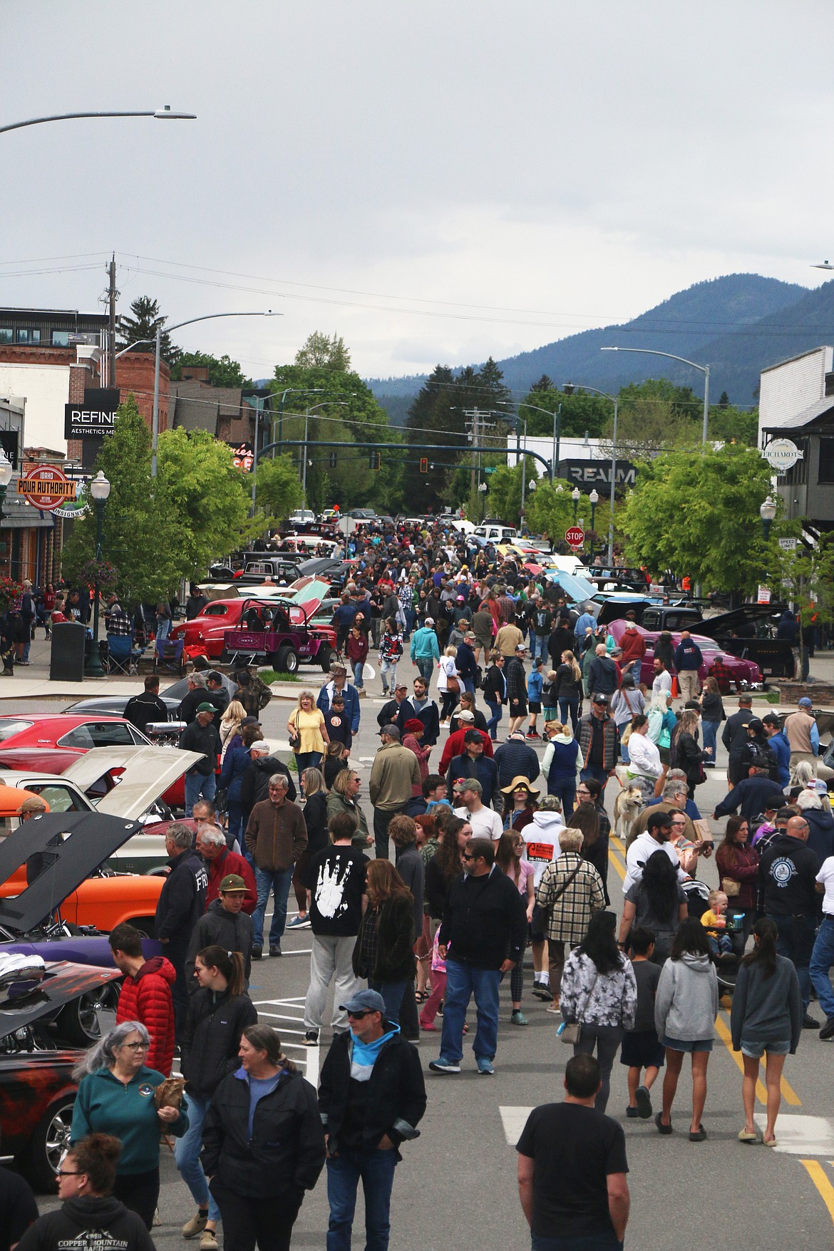 Classic car fans pack Cedar Street during Lost in the '50s classic car show on Saturday.