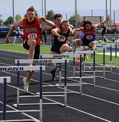 Courtesy photo
From left: Buhl's Jackson Allen, Timberlake's Caius Tebbe and Ben Walker of McCall-Donnelly look to clear their hurdle during the state 3A boys 300-meter hurdle finals on Saturday at Middleton High.