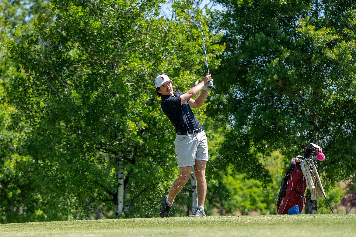 NIC ATHLETICS
North Idaho College sophomore Josh McCartain tees off on the seventh hole at Apple Tree Golf Course in Yakima, Wash., on Monday, in the final round of the Northwest Athletic Conference golf championships. McCartain finished second.