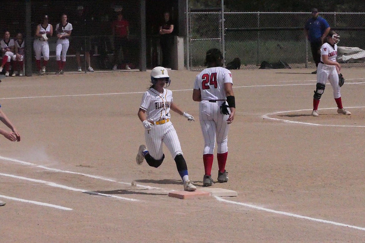 Thompson Falls senior MacKenzie Robinson is safe at first after hitting a single during the Lady Hawks game versus Three Forks this past weekend in the West Divisional tournament in Florence.  (Chuck Bandel/VP-MI)