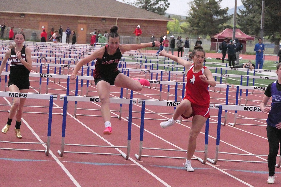 Hot Springs hurdler Kara Christensen clears the final hurdle in the women's 110 meter hurdles event this past Saturday at the Western Division B-C track and field meet in Missoula. (Chuck Bandel/VP-MI)