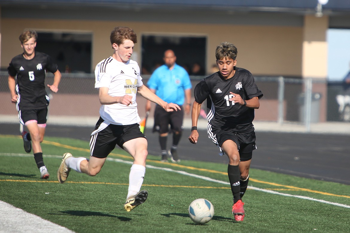 Royal senior Jairo Machado (17) brings the ball upfield during Friday’s second-round match against Meridian. Royal defeated the Trojans 1-0 before beating Seton Catholic 1-0 in a penalty shootout on Saturday.