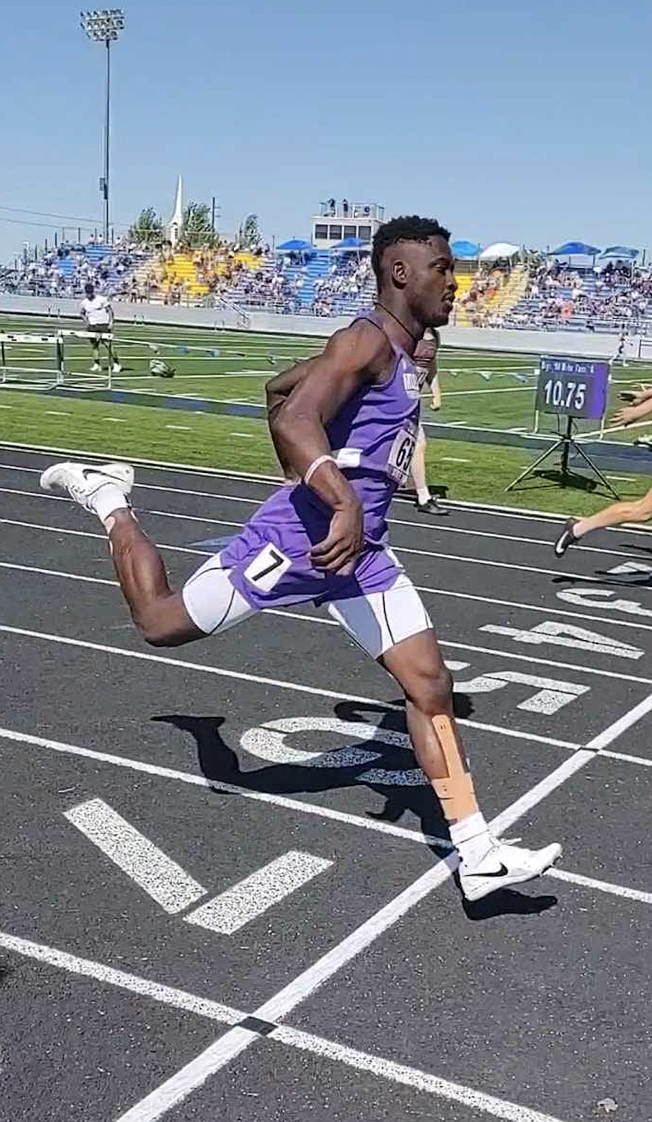 Mullan sprinter Kofi Appiah crosses the finish line during the 100 meter race at the 1A State Track Meet.