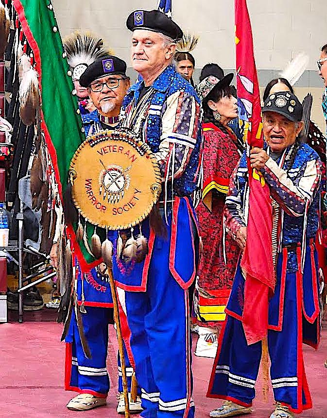 The Veterans Warrior Society carried the colors and led the dancers onto the dance floor during the Graduate Honoring Powwow on May 17 and 18. (Berl Tiskus/Leader)
