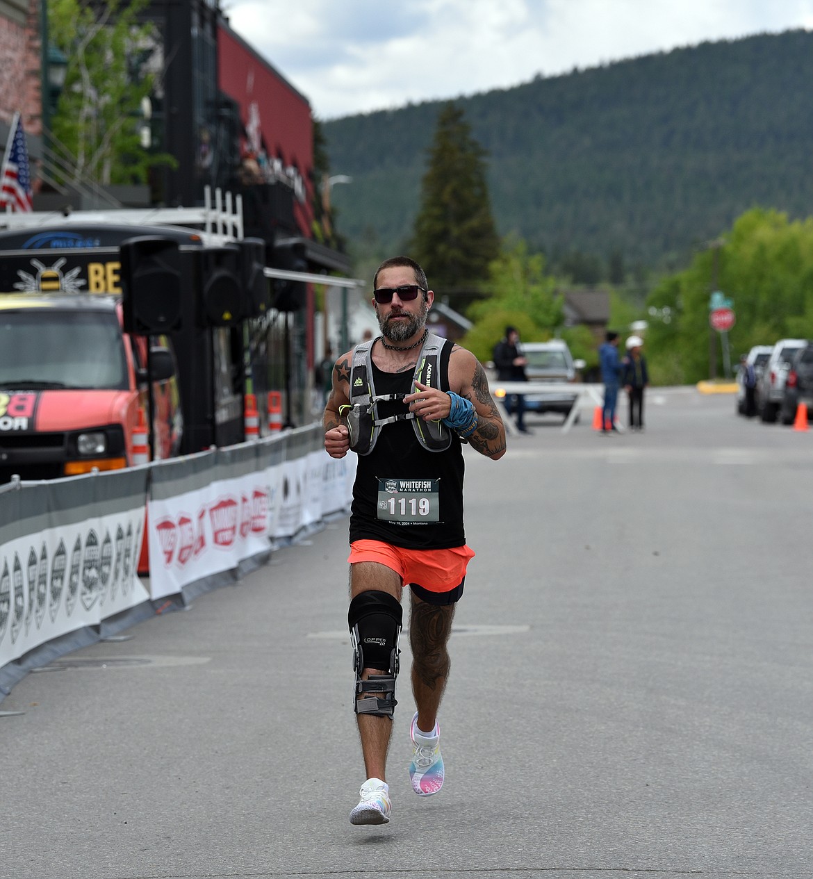 A finisher crosses the line at the Whitefish Marathon. (Julie Engler/Whitefish Pilot)