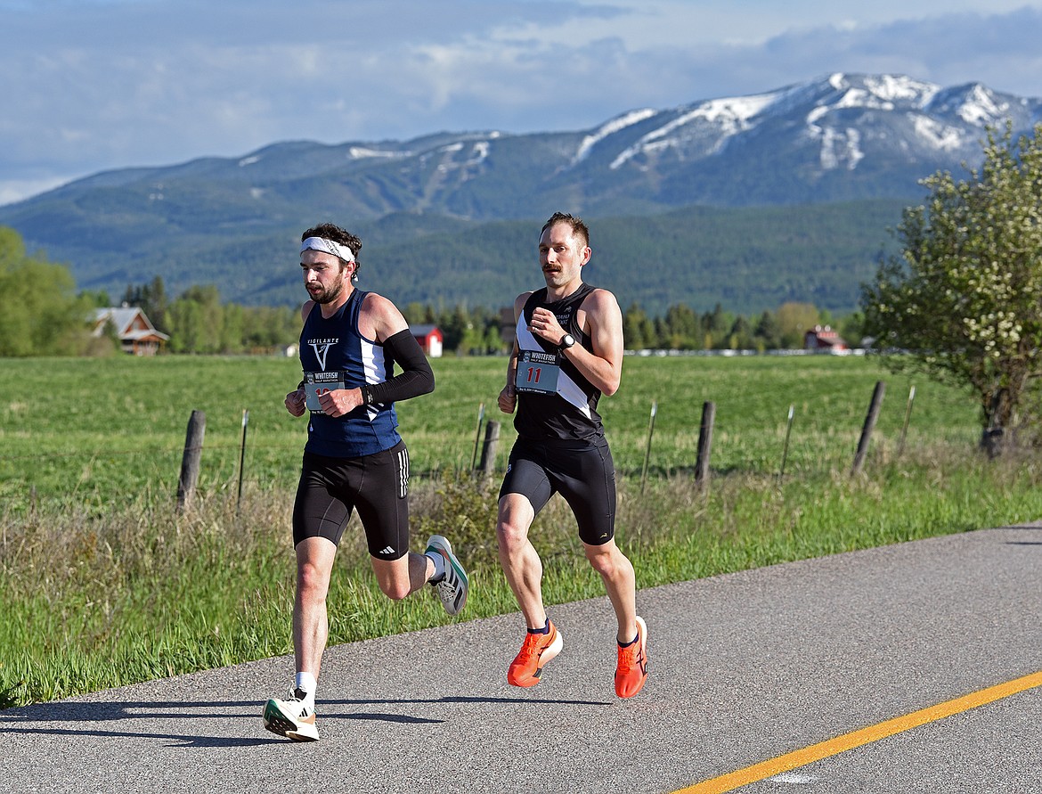 Two runners off to a quick start at the Whitefish Marathon. (Julie Engler/Whitefish Pilot)