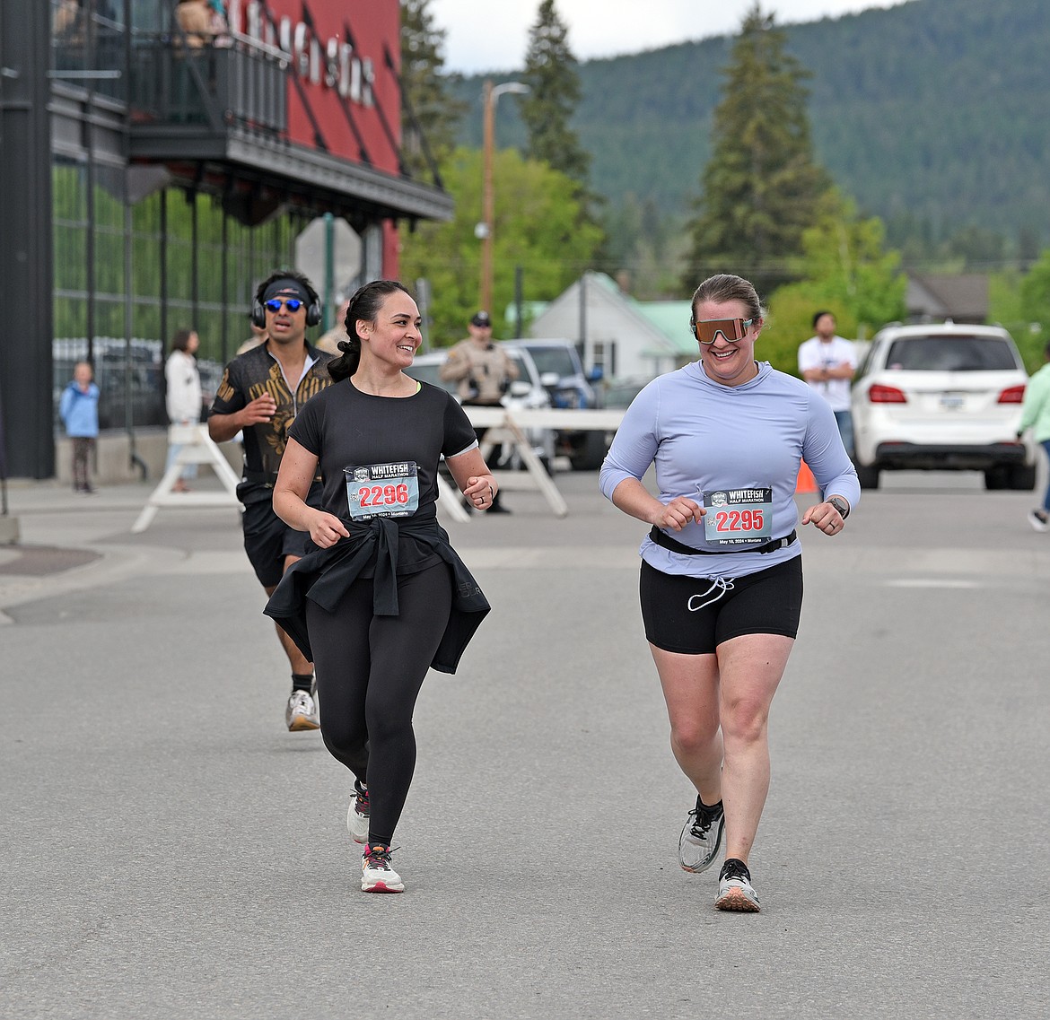 Three runners approach the finish line of the Whitefish Marathon. (Julie Engler/Whitefish Pilot)