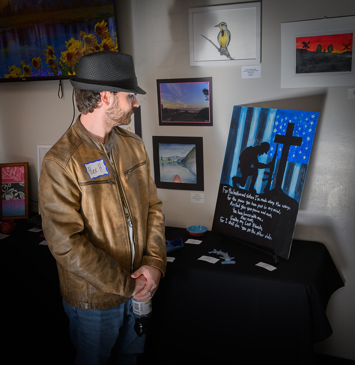Alex Horodyski shows the artwork he painted for his veteran father. (Tracy Scott/Valley Press)