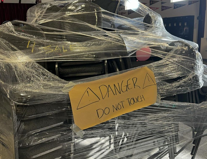 Tables and chairs were wrapped up and ready to move Tuesday morning after Coeur d'Alene Charter Academy seniors orchestrated a prank making it seem as though the school were for sale for $1 million and all items inside were for sale. "It’s very clever, very funny, the kind of stuff our kids do," Principal Dan Nicklay said.