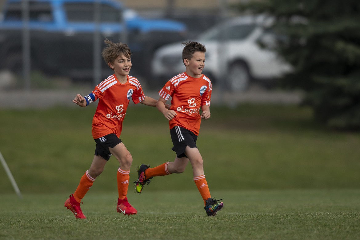 Courtesy photo
The FC North Idaho 2014 boys blue soccer team beat WE Surf SC 7-5 at Plantes Ferry Complex in Spokane. Luca Riley, left, and Declan Cleave celebrate after scoring a goal for FCNI.