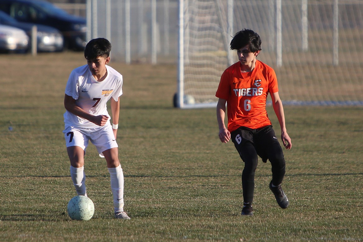 Moses Lake sophomore Kevin Segura (7) looks to get past Ephrata senior Vinci Pichardo during a match between the Mavericks and Tigers earlier this season. Moses Lake finished the year 6-11-1, while the Tigers concluded 2024 with a 5-12-1 record.
