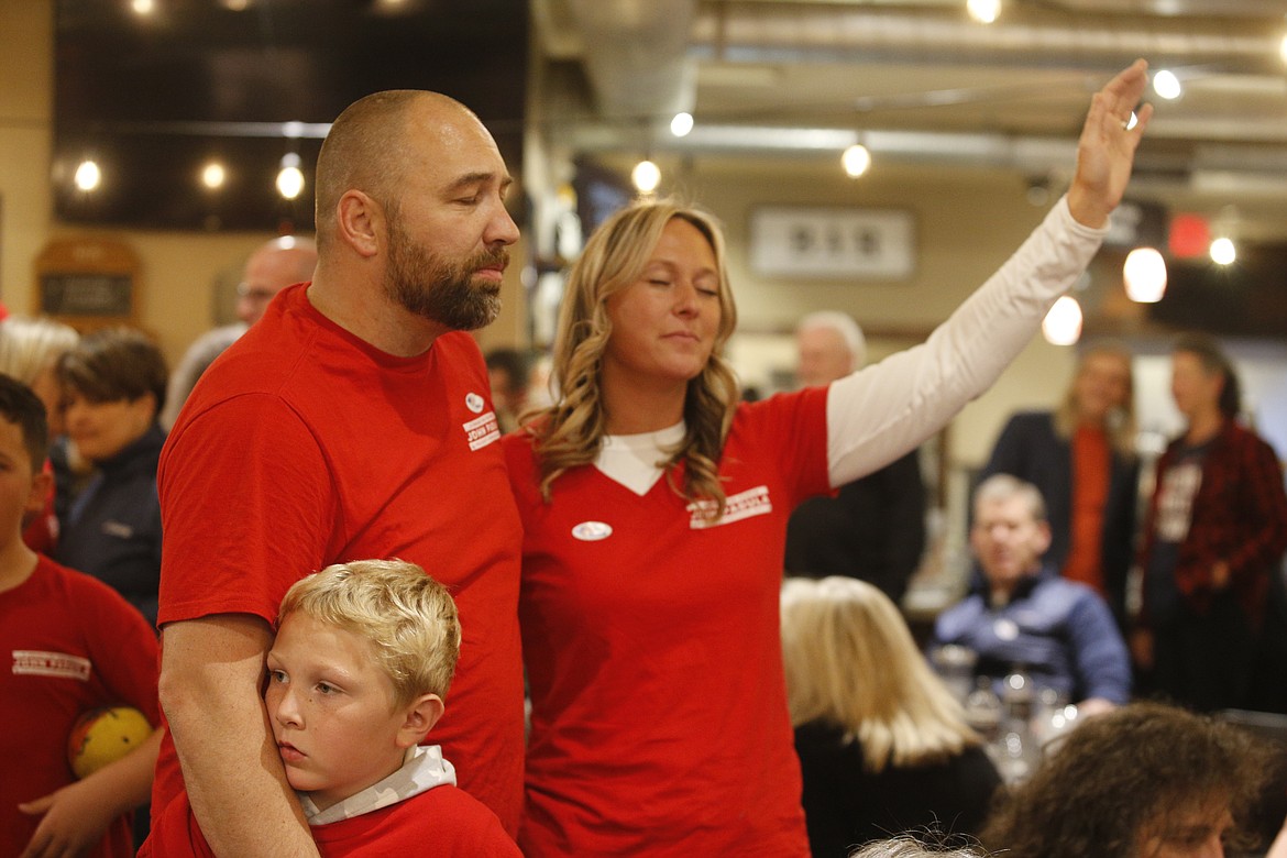 Kootenai County Commissioner District 1 candidate John Padula, alongside wife Amanda and son Ezekiel, join supporters at Lyfe Coffee.