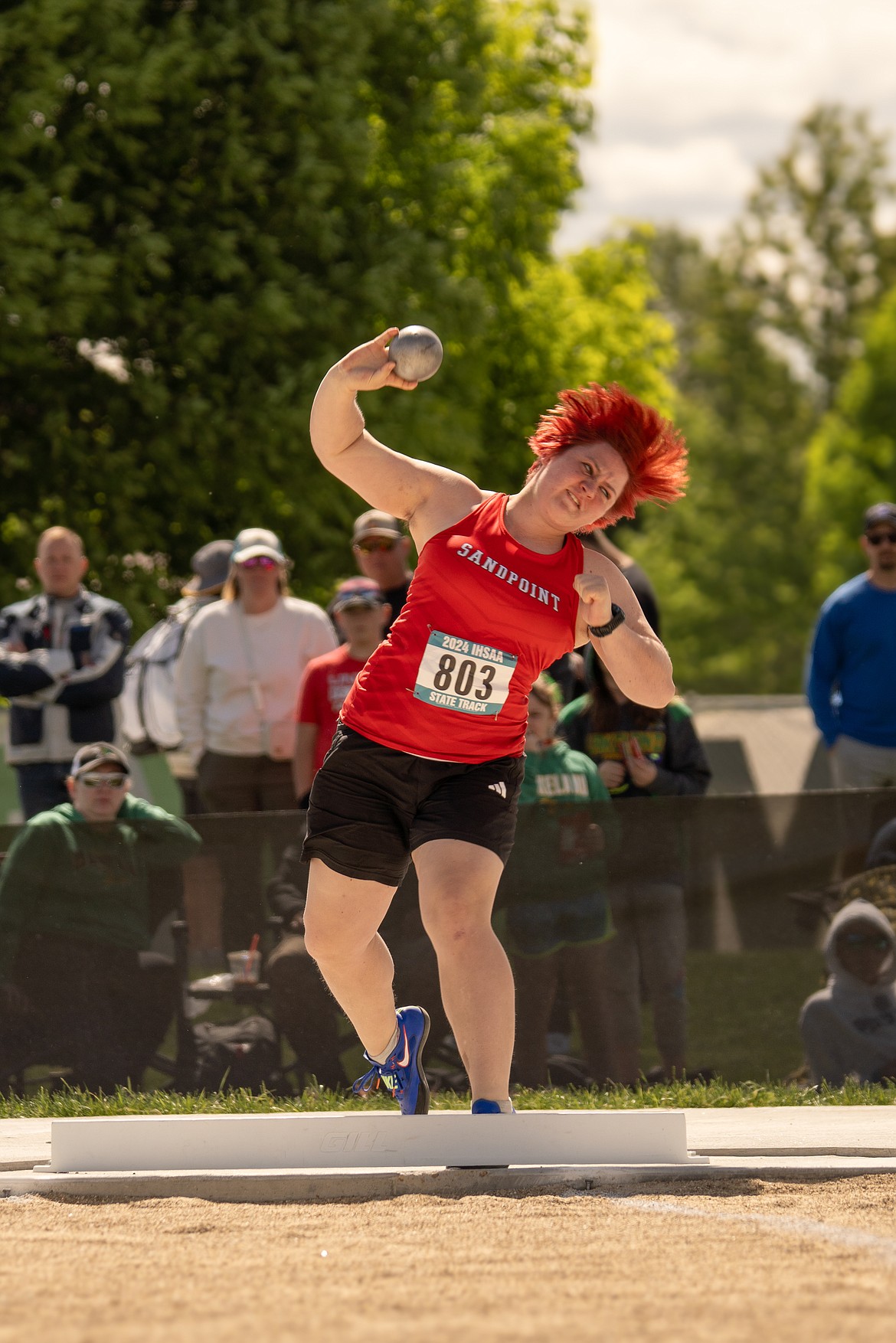 Sandpoint senior Ivy Smith tosses a new 4A state meet and Sandpoint high school record (44-7) in the shot put to win her second straight state title.