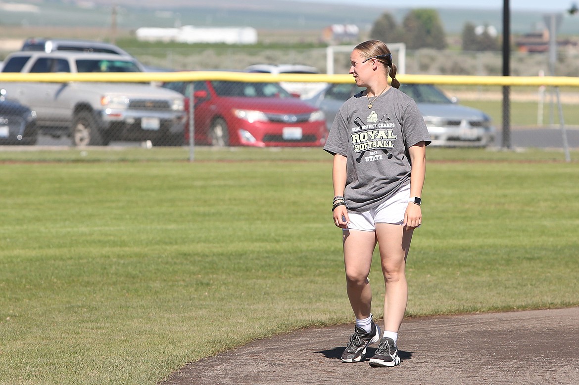 Ali Stanley looks on during warm-ups of a May 10 practice in Royal City. Stanley said she had interest in pursuing a coaching career once she concluded playing collegiate softball, but got a taste of the action a little earlier than expected.