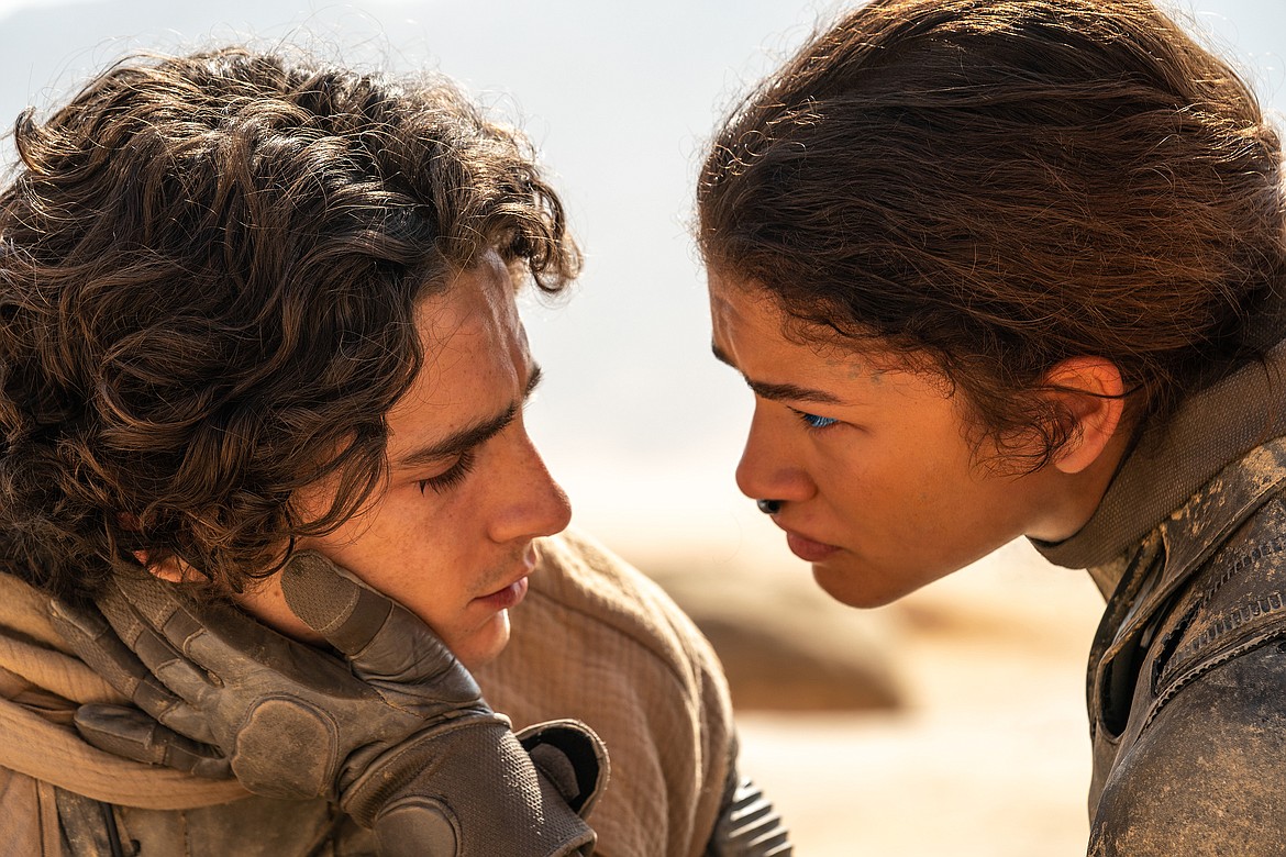 This image released by Warner Bros. Pictures shows Timothee Chalamet, left, and Zendaya in a scene from "Dune: Part Two."