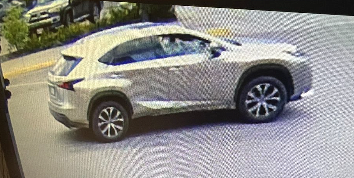 Surveillance footage shows the light-colored Lexus SUV that the suspect reportedly drove after he allegedly stole a handgun from a Missoula pawn shop on May 16.