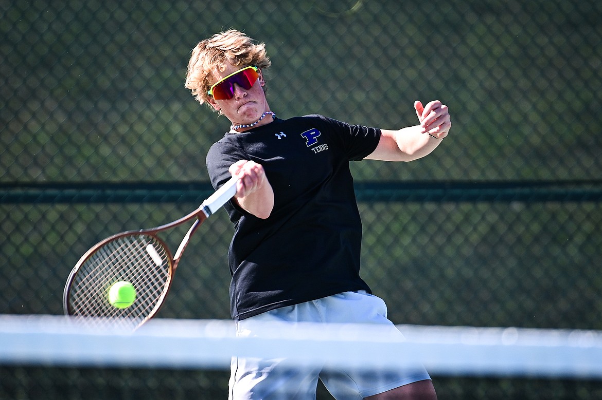 Polson's Tate Barentsen hits a return in a boys doubles match with teammate Otto Lund against Dillon's Jon Hernandez-Puga and Carson Fluckiger at the Class A State Tennis Tournament at FVCC on Thursday, May 23. (Casey Kreider/Daily Inter Lake)