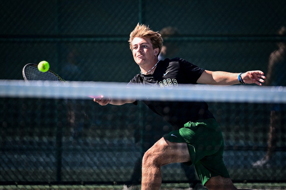 Whitefish's Dane Hunt hits a return in a boys doubles matchup with teammate Mason Kelch against Dillon's Isaac and Zach Sandall at the Class A State Tennis Tournament at FVCC on Thursday, May 23. (Casey Kreider/Daily Inter Lake)