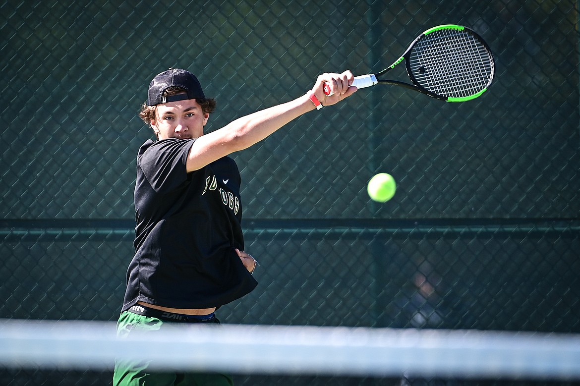 Whitefish's Mason Kelch hits a return in a boys doubles matchup with teammate Dane Hunt against Dillon's Isaac and Zach Sandall at the Class A State Tennis Tournament at FVCC on Thursday, May 23. (Casey Kreider/Daily Inter Lake)