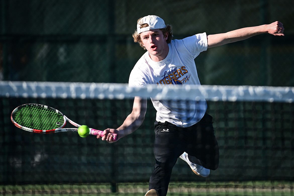 Libby's Ryan Beagle charges the net in a boys singles match against Corvallis' Pierce Yaskus at the Class A State Tennis Tournament at FVCC on Thursday, May 13. (Casey Kreider/Daily Inter Lake)