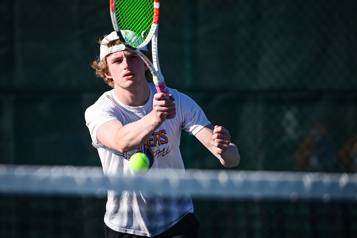 Libby's Ryan Beagle hits a return in a boys singles match against Corvallis' Pierce Yaskus at the Class A State Tennis Tournament at FVCC on Thursday, May 13. (Casey Kreider/Daily Inter Lake)