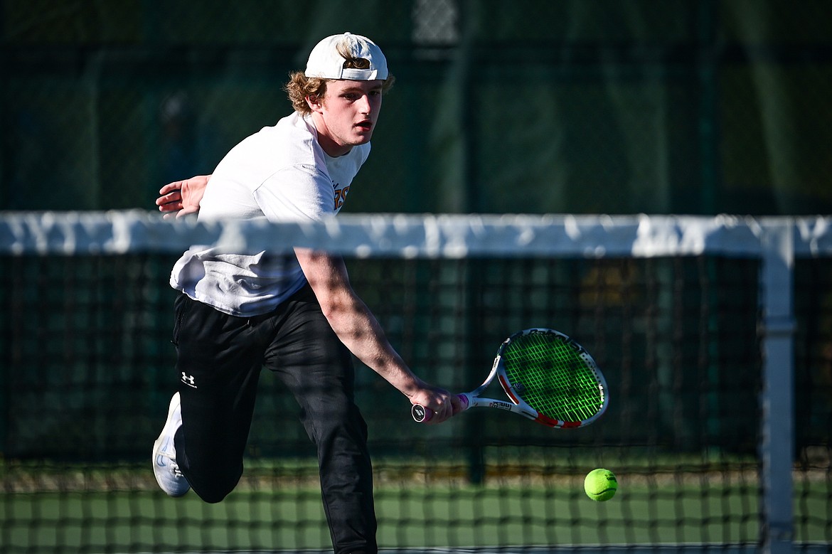 Libby's Ryan Beagle charges the net in a boys singles match against Corvallis' Pierce Yaskus at the Class A State Tennis Tournament at FVCC on Thursday, May 13. (Casey Kreider/Daily Inter Lake)