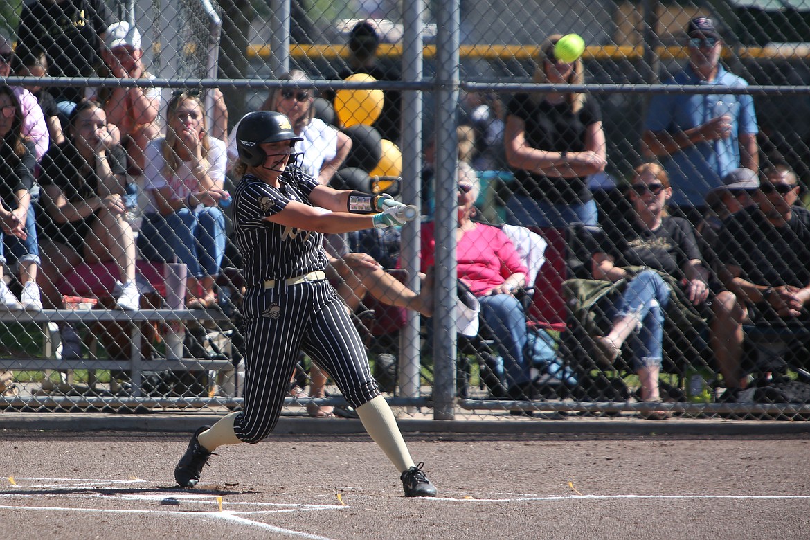 Royal sophomore Taylor Webb singles to drive in Royal’s first run of a 10-0 win over Klahowya in the 1A State Softball Tournament.