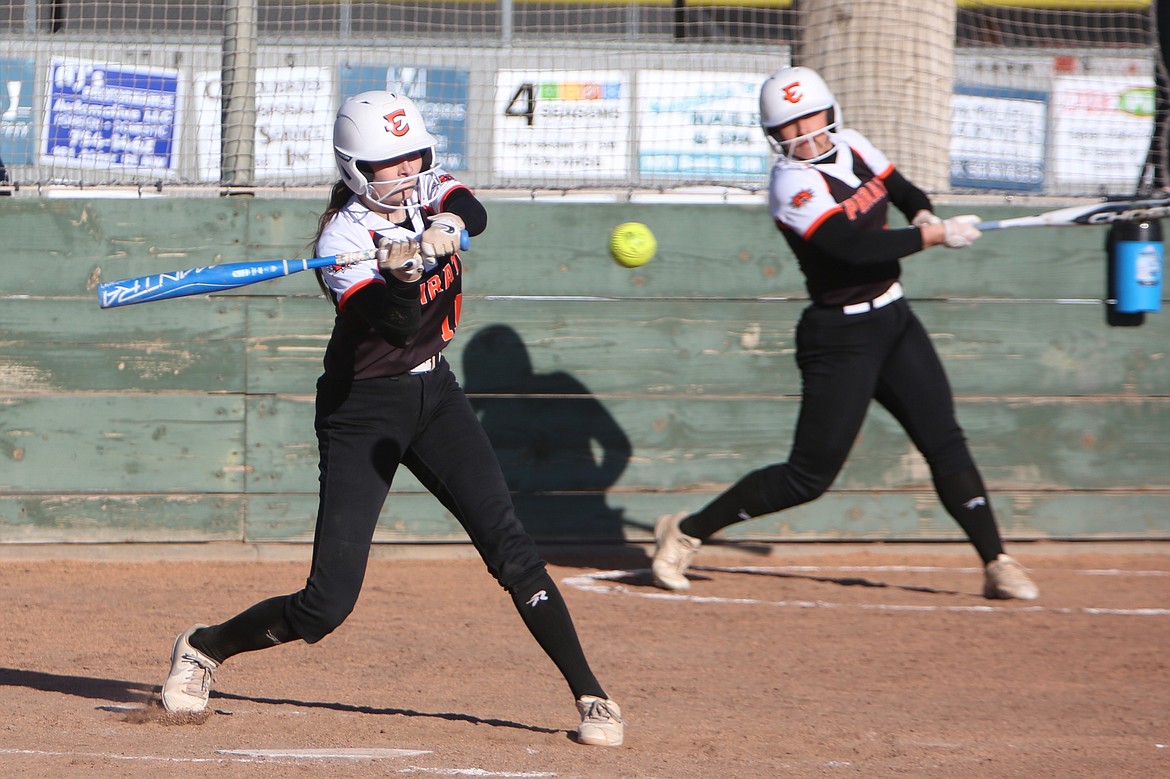 Ephrata freshman Kaylynn Spencer, left, swings at a pitch during a game against Othello on April 29. The Tigers are back at the 2A State Softball Tournament for the first time since 2019, earning a No. 11 seed and taking on No. 6 Tumwater in the first round on Friday morning.